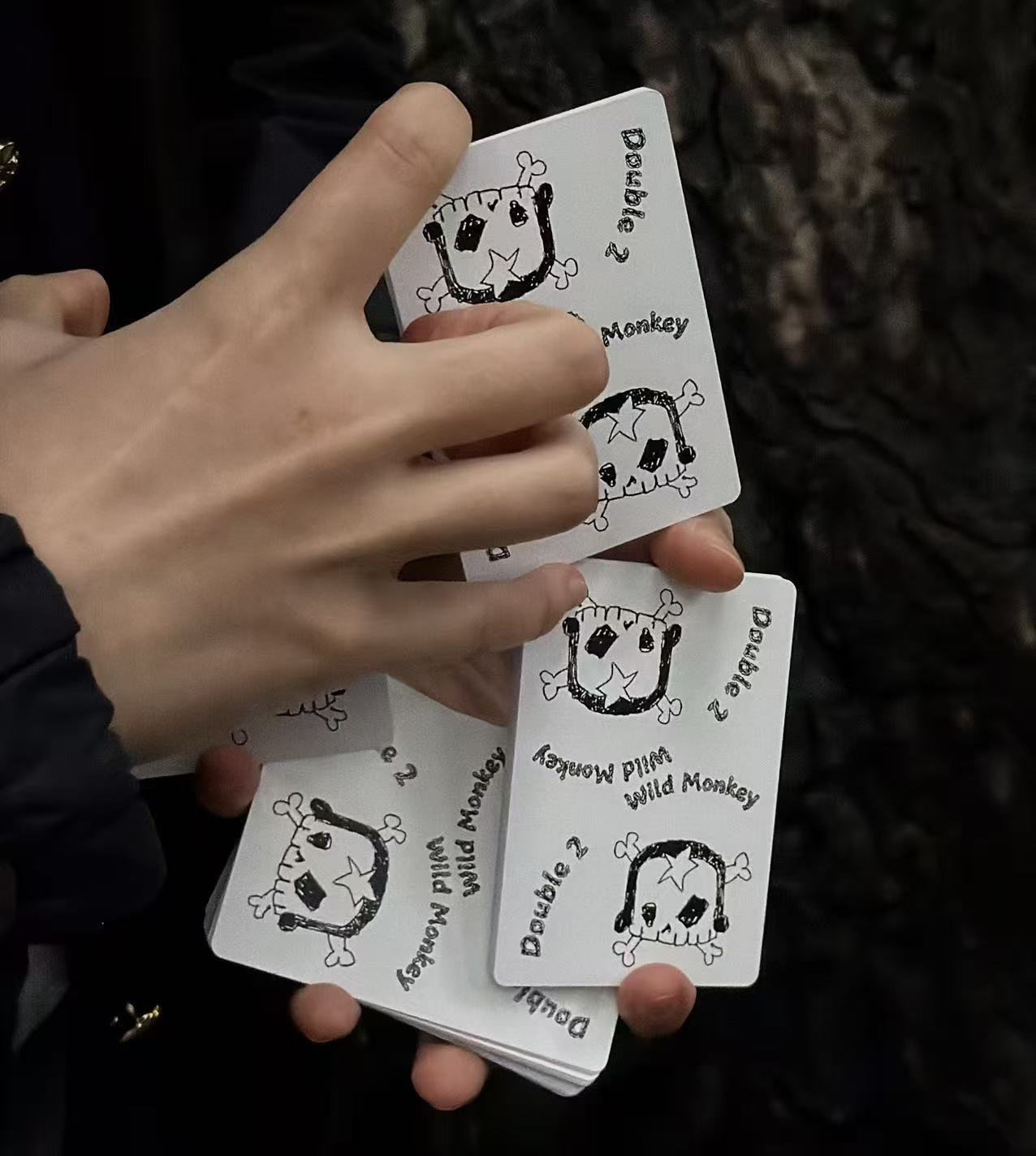 Wild Monkey Playing Cards in a cardistry flourish