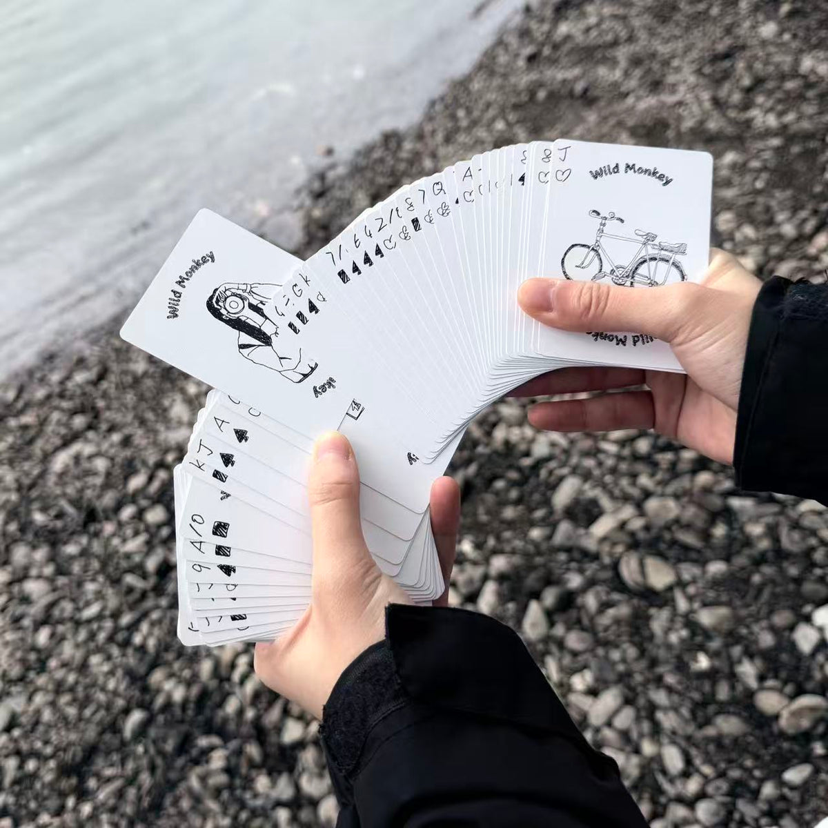 Wild Monkey Playing Cards fanned outdoors